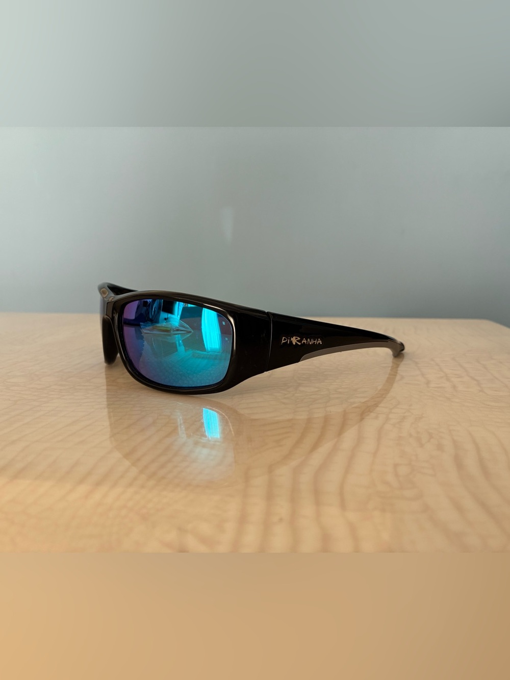 Piranha Men's Black Sunglasses with Blue Mirrored Lenses